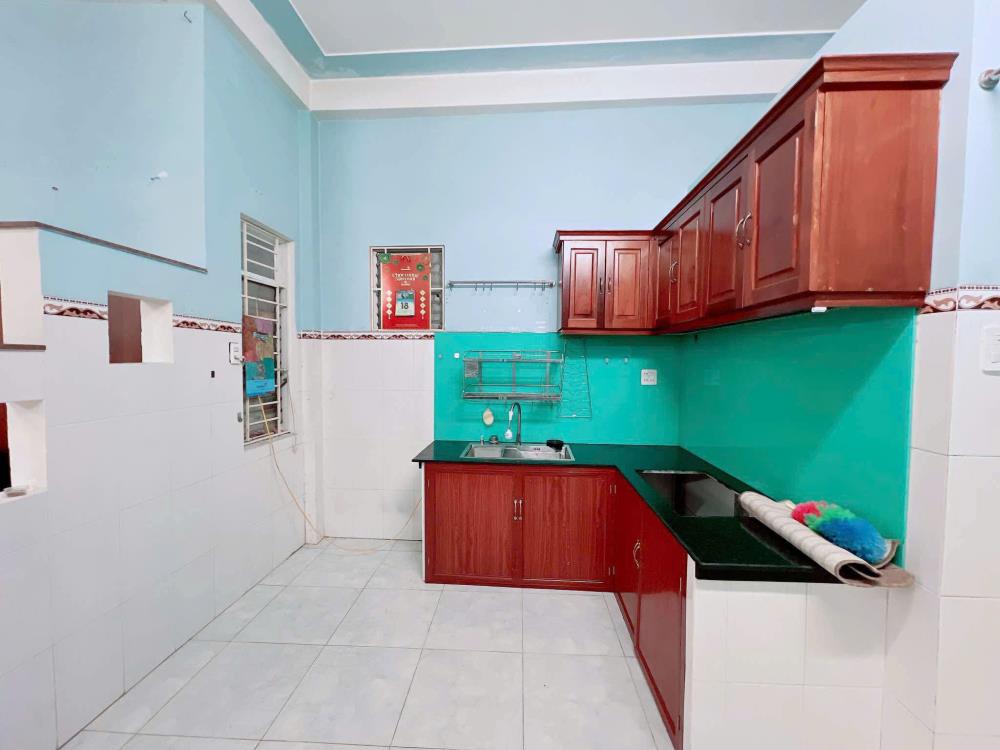 Cho thuê nhà nguyên căn hẻm 2 xe máy sau 1 căn mặt tiền khu Trần Hưng Đạo, gần chung cư Atara, Tp Quy Nhơn2320013