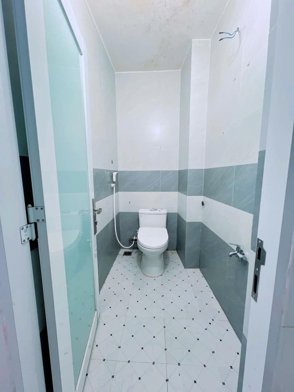 Cho thuê nhà nguyên căn hẻm 2 xe máy sau 1 căn mặt tiền khu Trần Hưng Đạo, gần chung cư Atara, Tp Quy Nhơn2320014